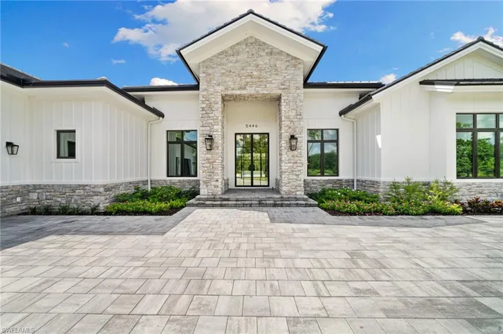 Entrance to property with a patio