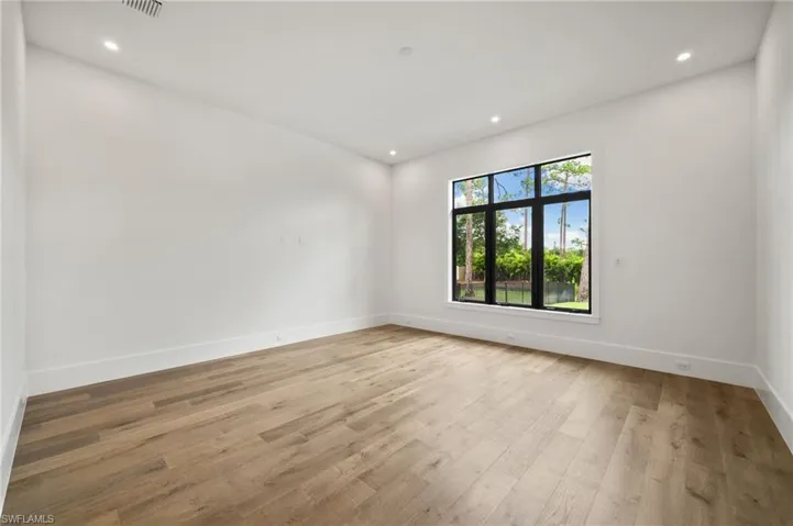 Spare room featuring light hardwood / wood-style floors