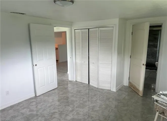 Room featuring contemporary tile flooring