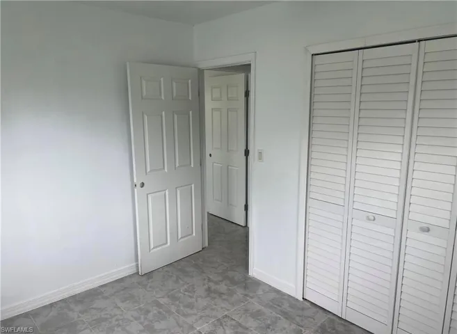 Light-toned tile flooring throughout