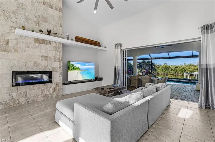 Living Room w/ Fireplace and flatscreen tv