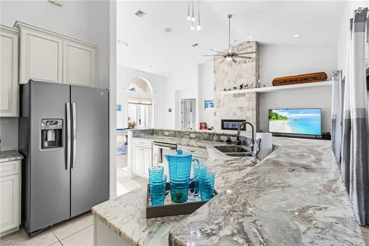 Open Concept Kitchen w/ stainless steel appliances