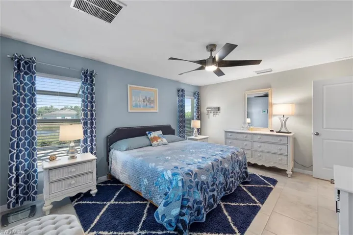 Primary bedroom with ceiling fan