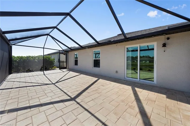 View of patio / terrace with a lanai