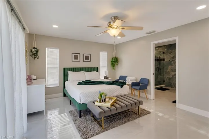 Bedroom with ceiling fan, baseboards, visible vents, and recessed lighting