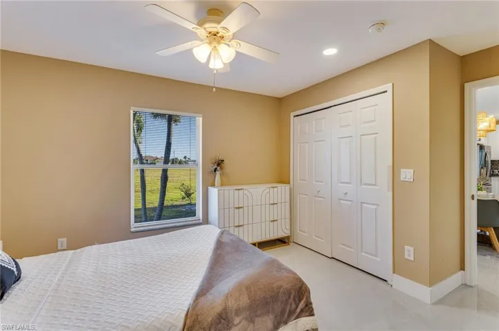 Bedroom with recessed lighting, a closet, baseboards, and ceiling fan