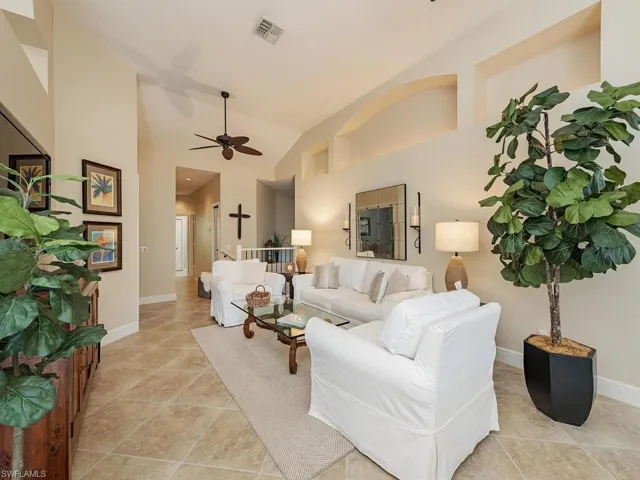 Newer tile flooring in living room, dining, kitchen & hall