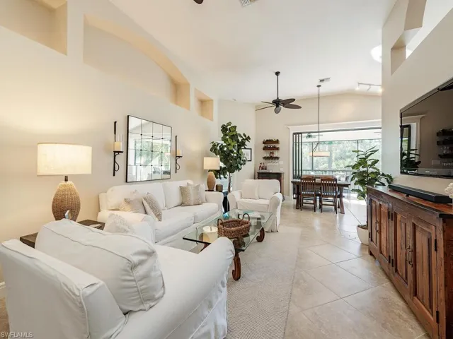 Volume ceilings open to lanai & kitchen