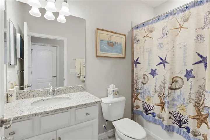 Bright guest bath offering a comfortable design with quality fixtures and a practical layout.