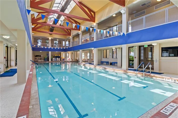 Beautiful indoor community pool in Pelican Preserve offering a comfortable, climate-controlled space for year-round swimming and relaxation.