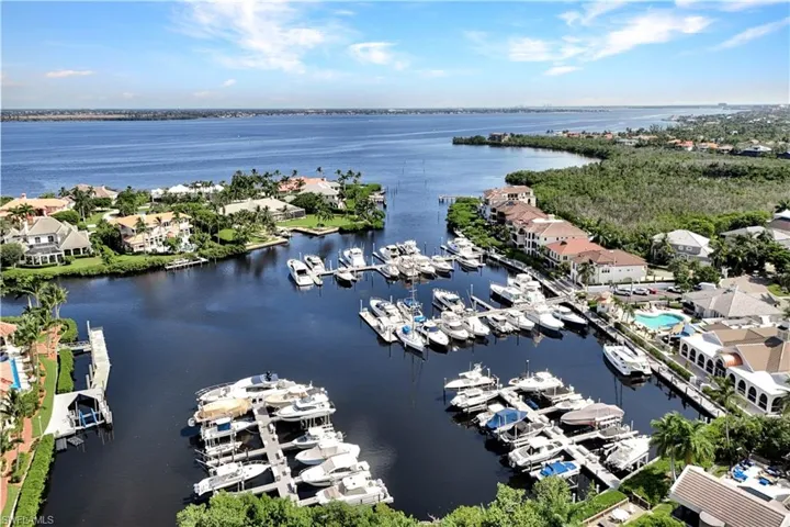 Birds eye view of Waite Island Dr. and 15740 Waite Island Dr. Point Lot, St. Charles Yacht Club, Marina out to the river and intracoastal waterways. No Bridges to the Gulf of Mexico