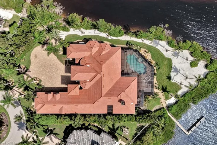 Drone / aerial view with a water view 256 ft on the river, just under an acre point lot