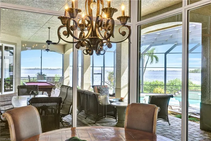 Large Kitchen Breakfast Area with seating for 8 and endless Water Views