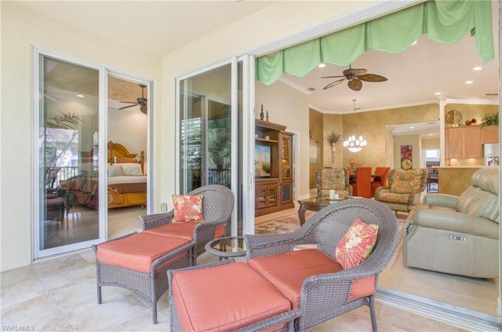 Living room sliders open to the lanai