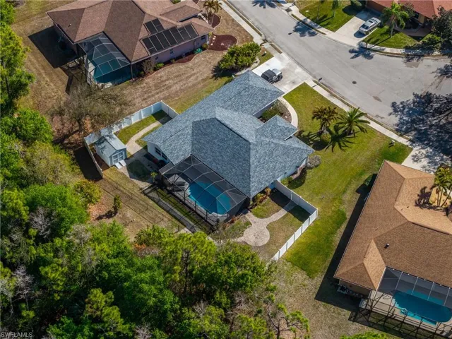 View from above of property featuring a pool