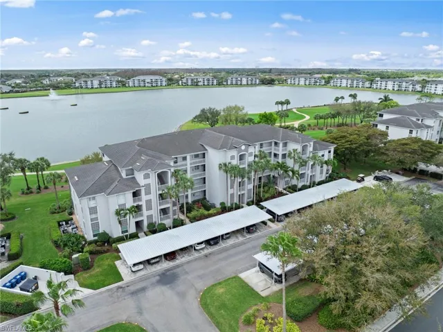 Bird's eye view of apartment complex / building and a nearby body of water