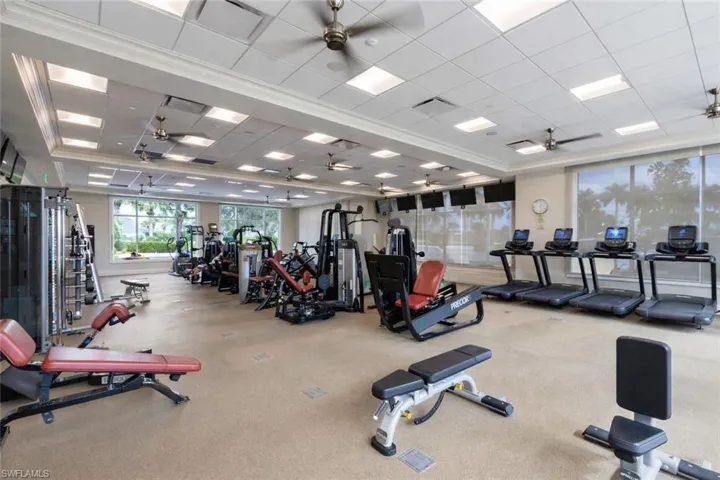 Workout area with a paneled ceiling