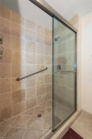 Full bath with a shower stall