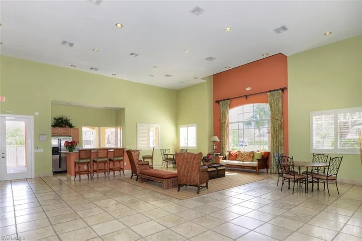 Lobby featuring a towering ceiling and recessed lighting