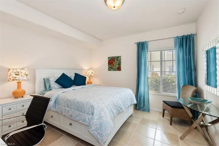 Bedroom featuring baseboards