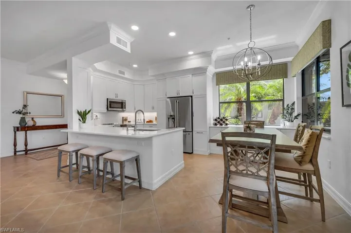 Open concept kitchen with Breakfast bar and Breakfast table