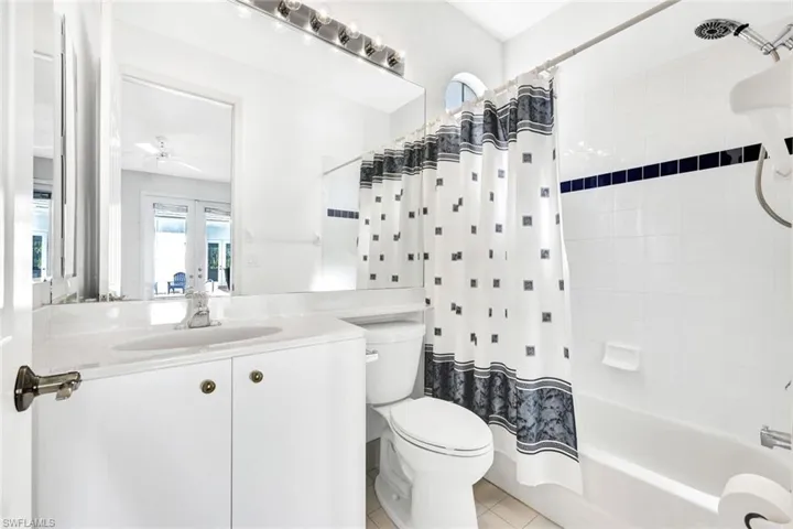 Third bedroom features an ensuite bathroom with a show and tub combo.