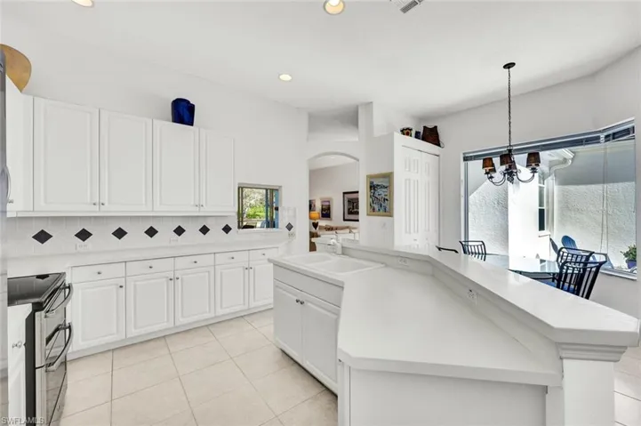 Well-appointed kitchen with ample storage and workspace.