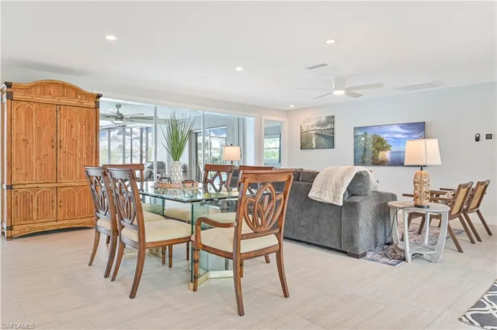 Dining room featuring a ceiling fan and recessed lighting