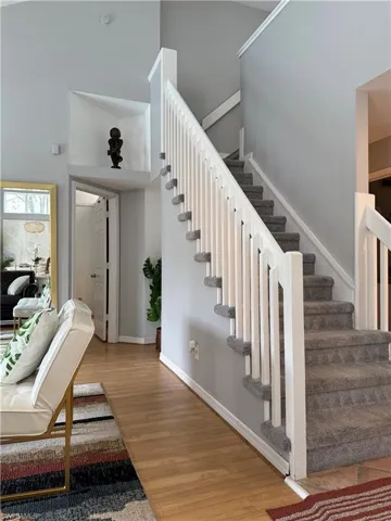 Master bedroom left of stairs