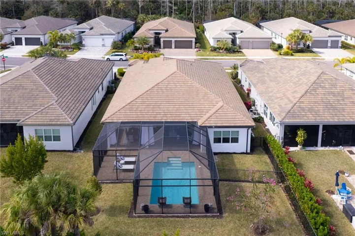 Aerial view of residential area with a pool area