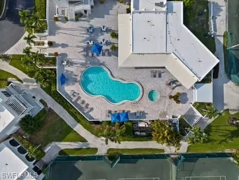 Aerial overview of property's location featuring a pool