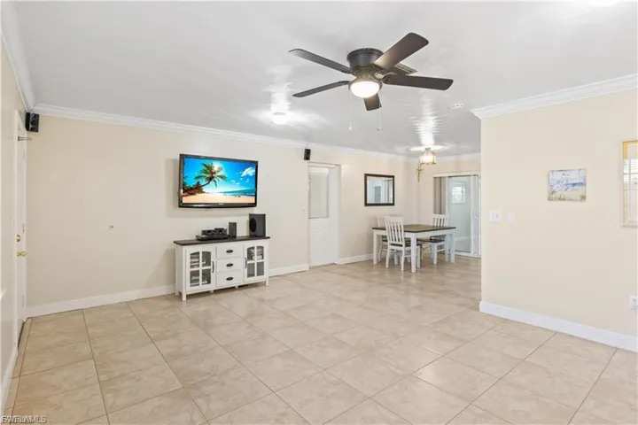 Living Room toward Dining Area and door to garage