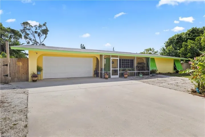 2 car garage, paved driveway