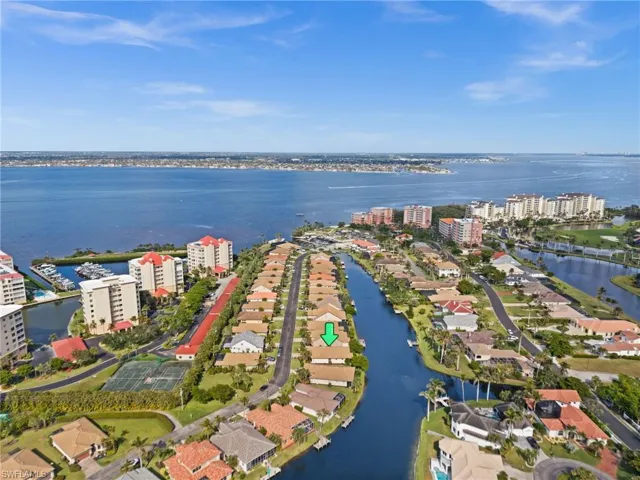 WELCOME to this meticulous top notch Lakefront Home in the sophisticated Water's Edge Marina Development, with DIRECT GULF ACCESS!