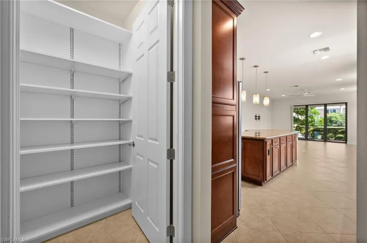 HUGE storage space behind the kitchen.