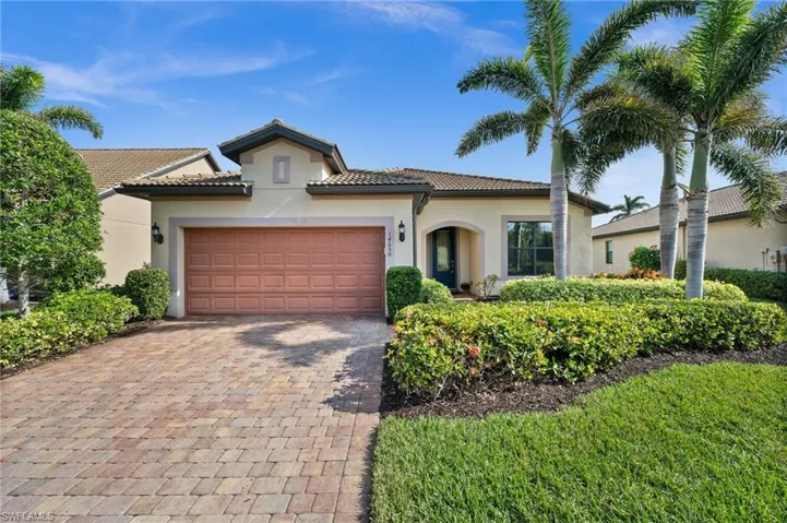 Welcome to 14650 Laguna Drive, a beautiful  lakefront home with a boat dock and just minutes from the Gulf of Mexico!