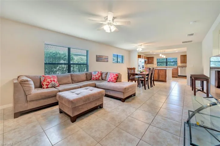 Tiled GREAT room with ceiling fan