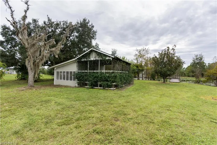 1291 S. Swinging Trail, Muse, FL, 15.21 Acres with pond and 3/2 immaculate home