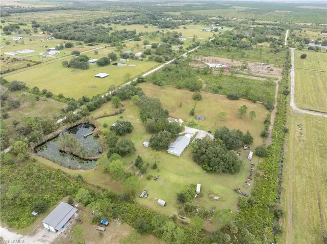 1291 S. Swinging Trail, Muse, FL, 15.21 Acres with pond and 3/2 immaculate home