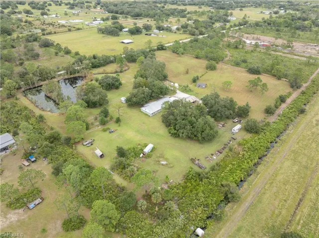 1291 S. Swinging Trail, Muse, FL, 15.21 Acres with pond and 3/2 immaculate home