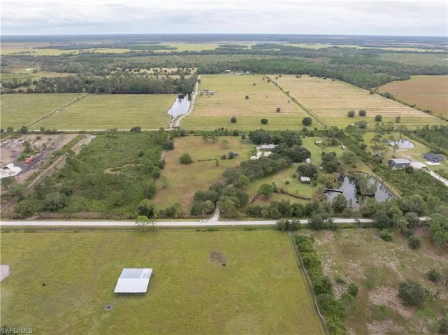 1291 S. Swinging Trail, Muse, FL, 15.21 Acres with pond and 3/2 immaculate home