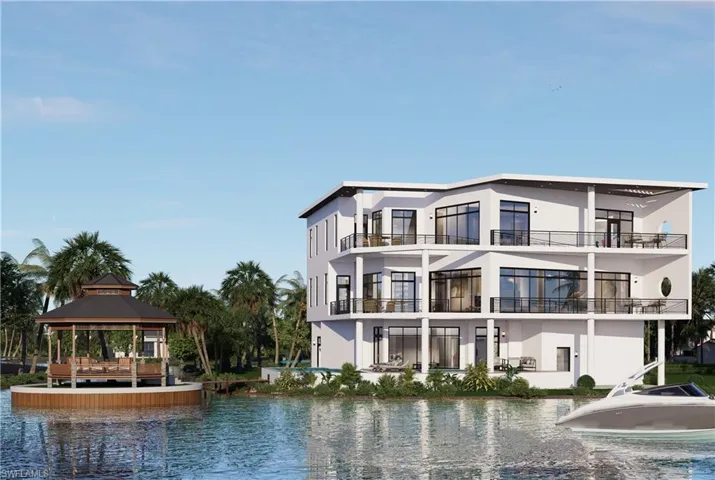 Back of property featuring a water view, a gazebo, and stucco siding