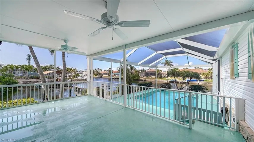 Covered lanai leads to pool deck