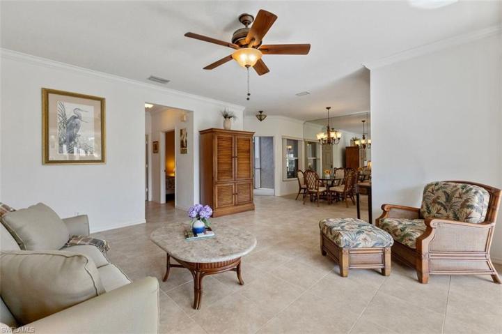 Fabulous open floor plan with view of formal dining room from living area