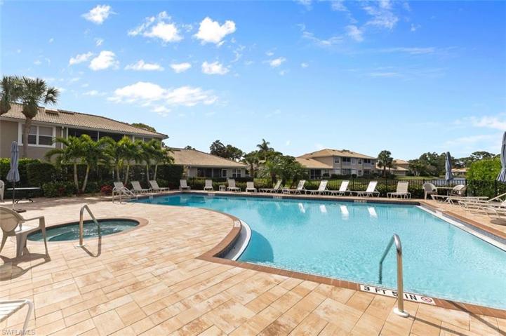 Expansive community pool with hot tub