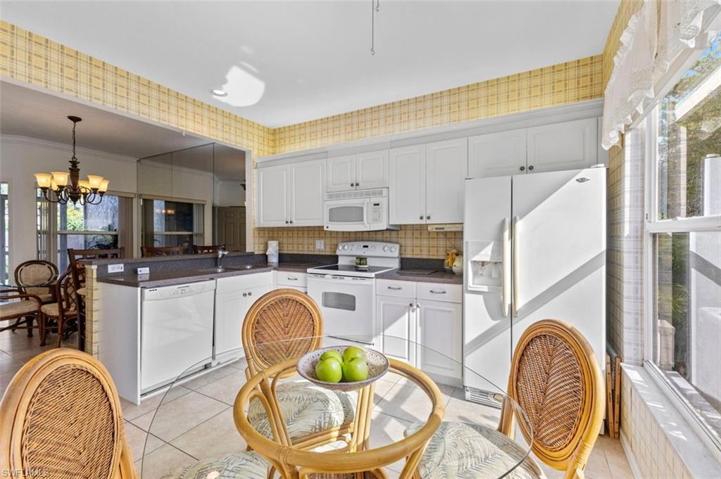 Great kitchen with ample closet space and counter bar area just perfect for entertaining!