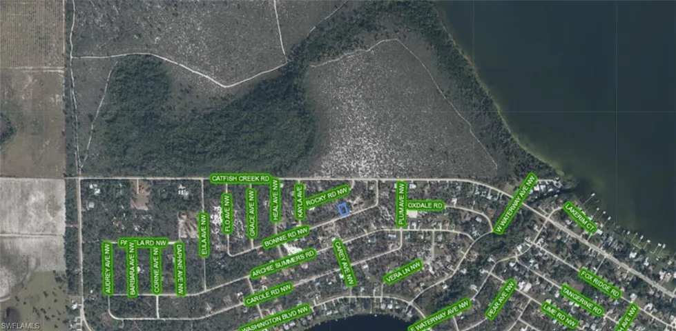 Aerial Map. Displaying the geographic layout of roads and waterways relative to the property