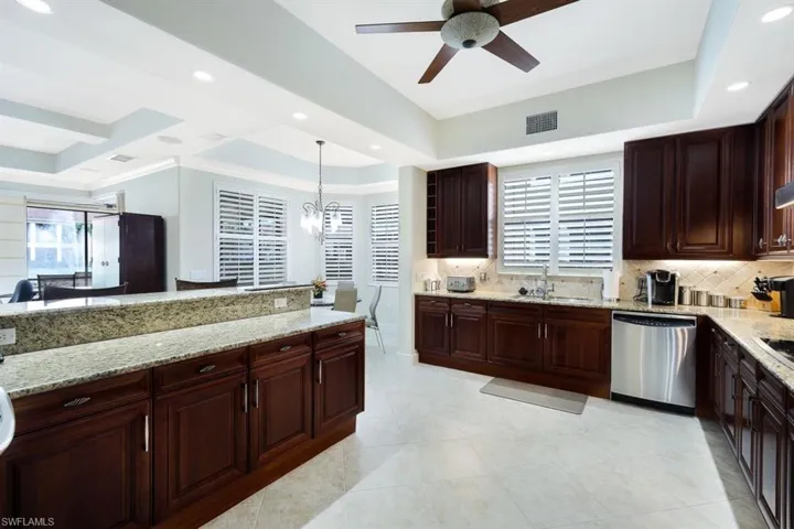 Open kitchen with views to lake and great room