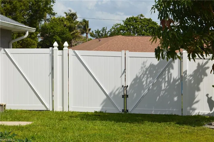 View of Large Gate with fence.