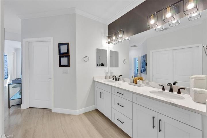 Primary Bath double sinks new faucets and vanity lighting